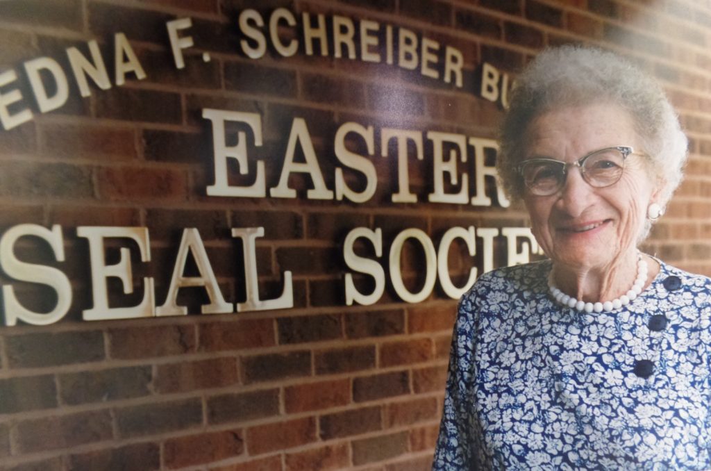 Image shows Edna Schreiber outside of the Easter Seal Society