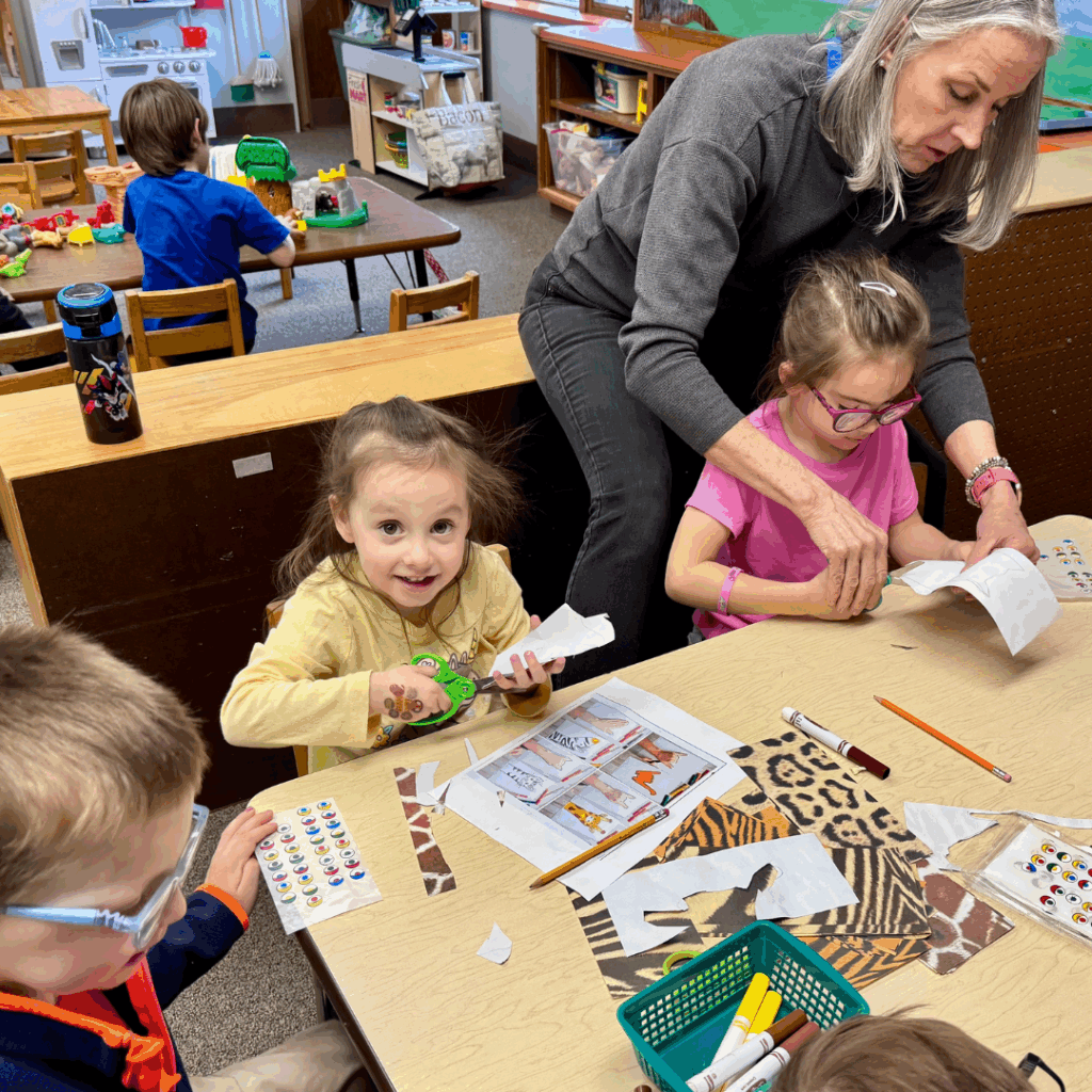 kids in stars preschool doing arts & crafts