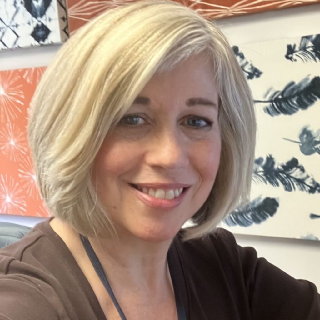 Woman with short blonde hair